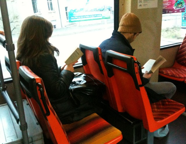 Readers In Bus
